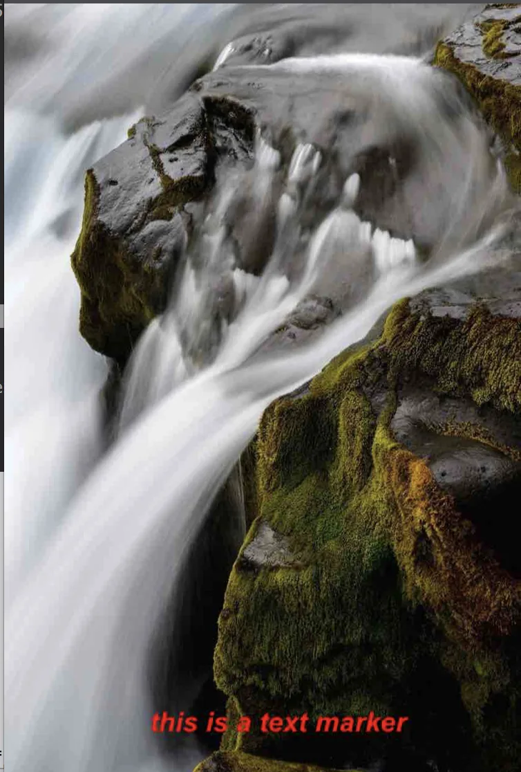 A text watermark placed near the bottom of a waterfall photo
