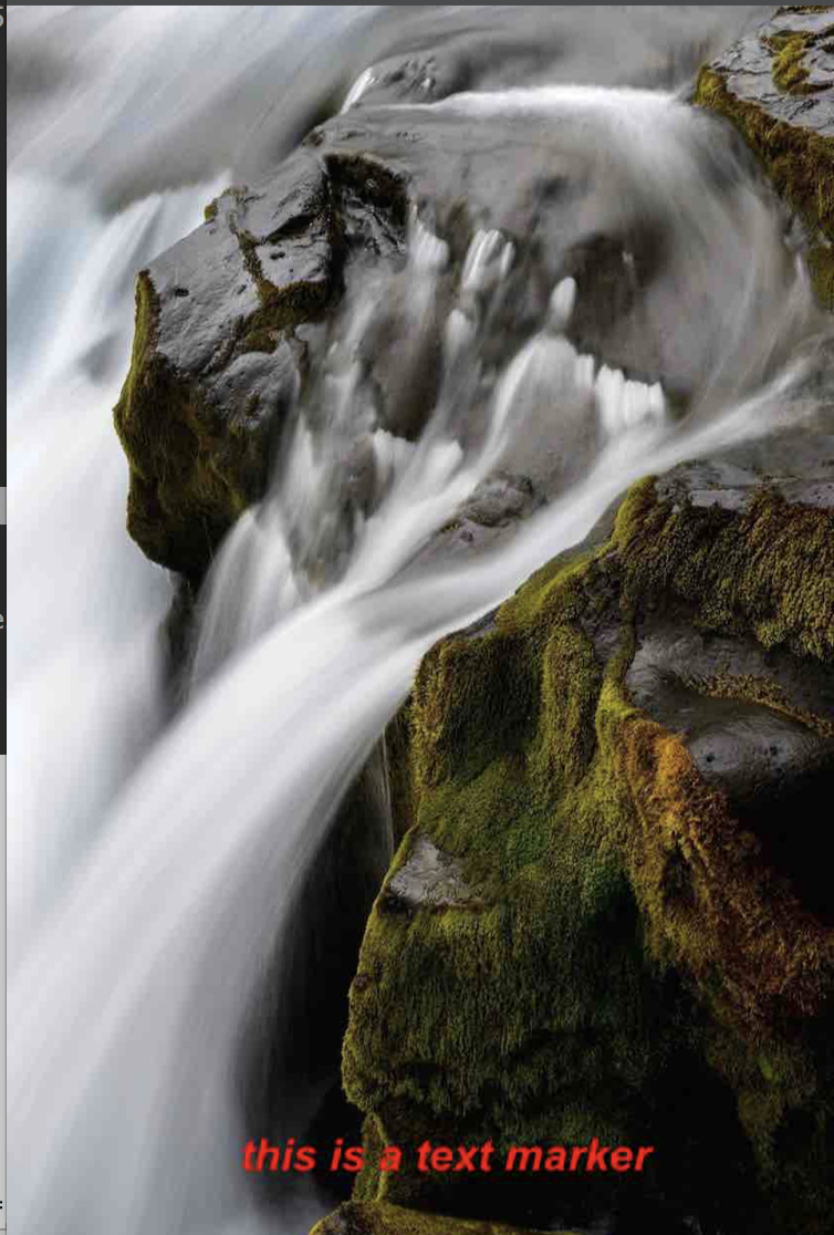 A text watermark placed near the bottom of a waterfall photo